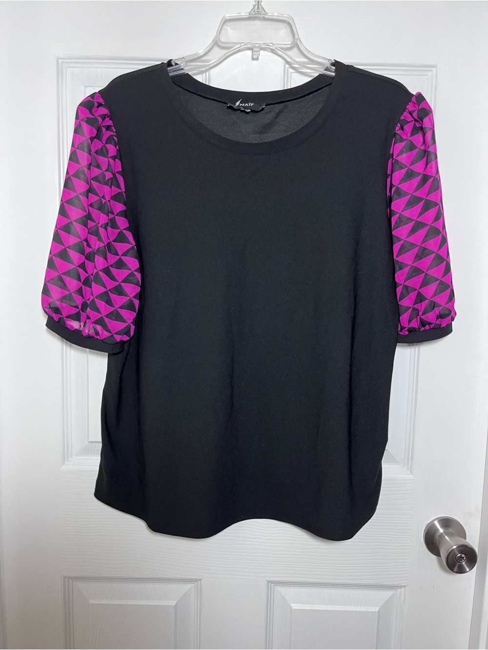 NAIF Black Top with Fuchsia Geometric Puff Sleeves